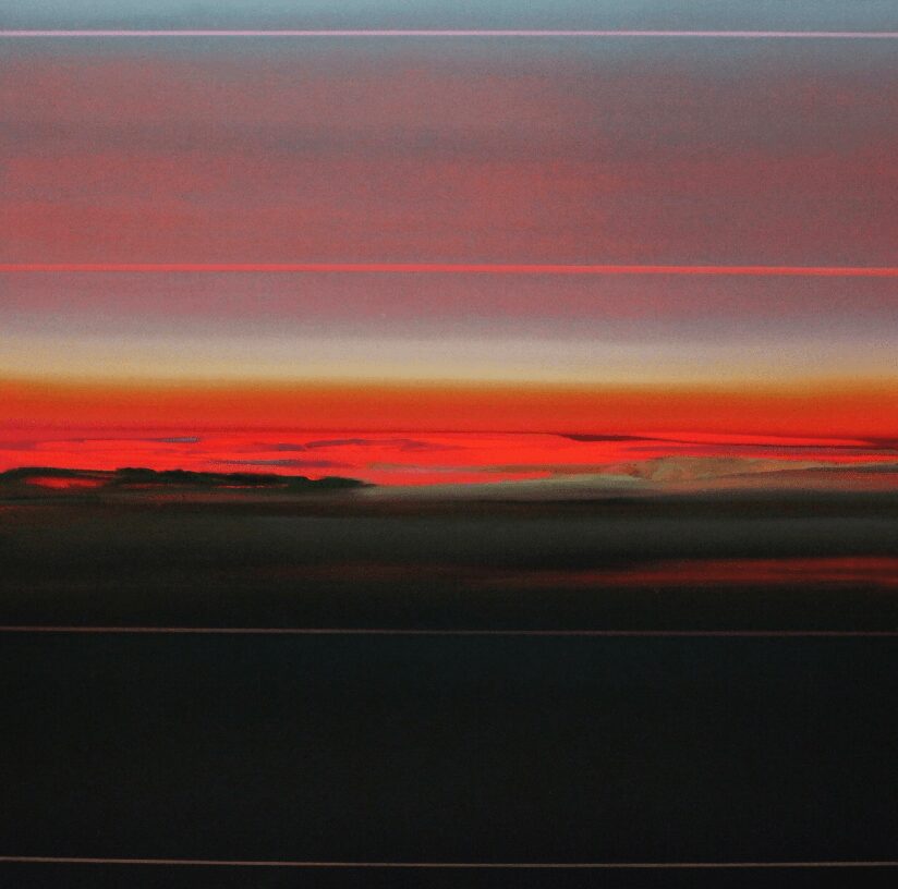 Abstract sunset sky with horizontal bands of red, orange, pink, and dark colors.