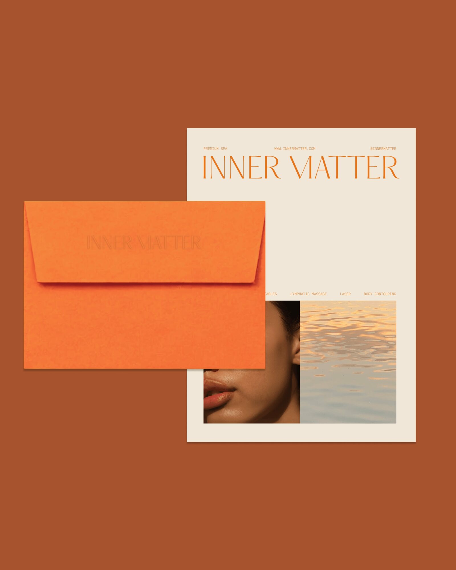 Book titled 'Inner Matter' with an orange envelope on a brown background, partially covering the cover, which shows a woman's lips and a water scene.