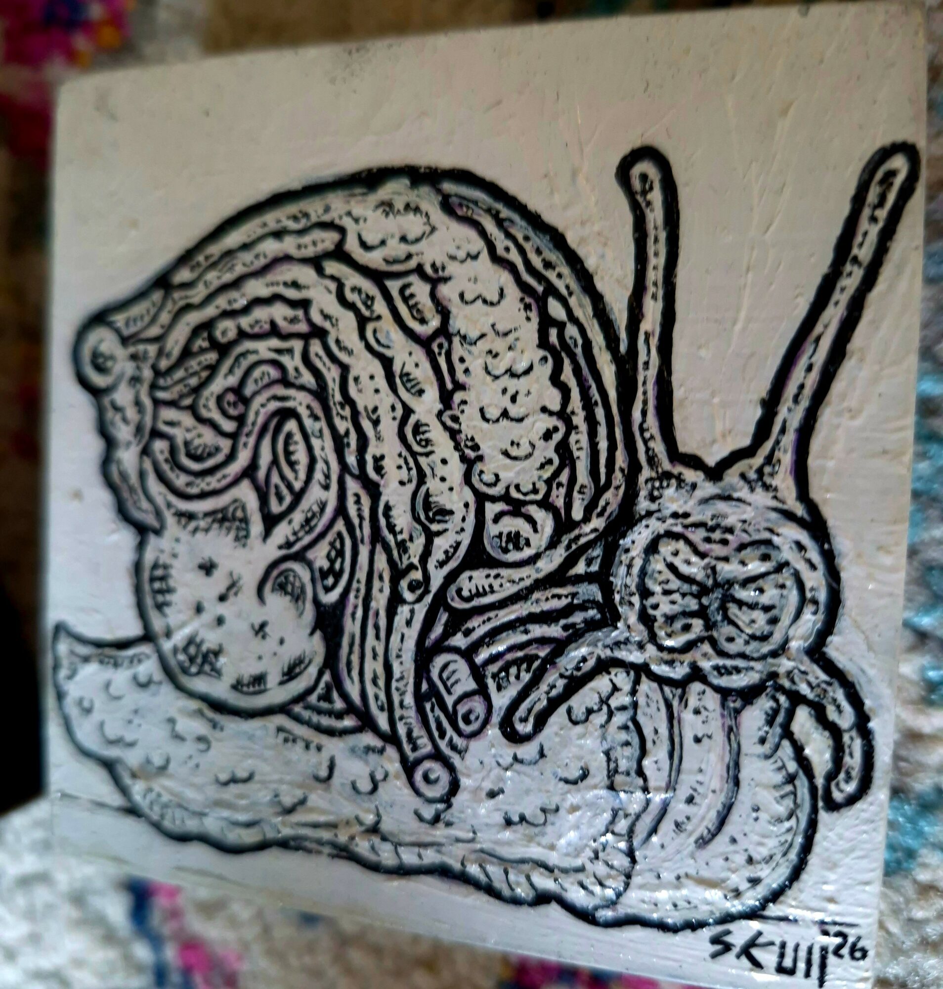 Drawing of a snail with a person on its shell, detailed lines, and the artist's signature in the corner.