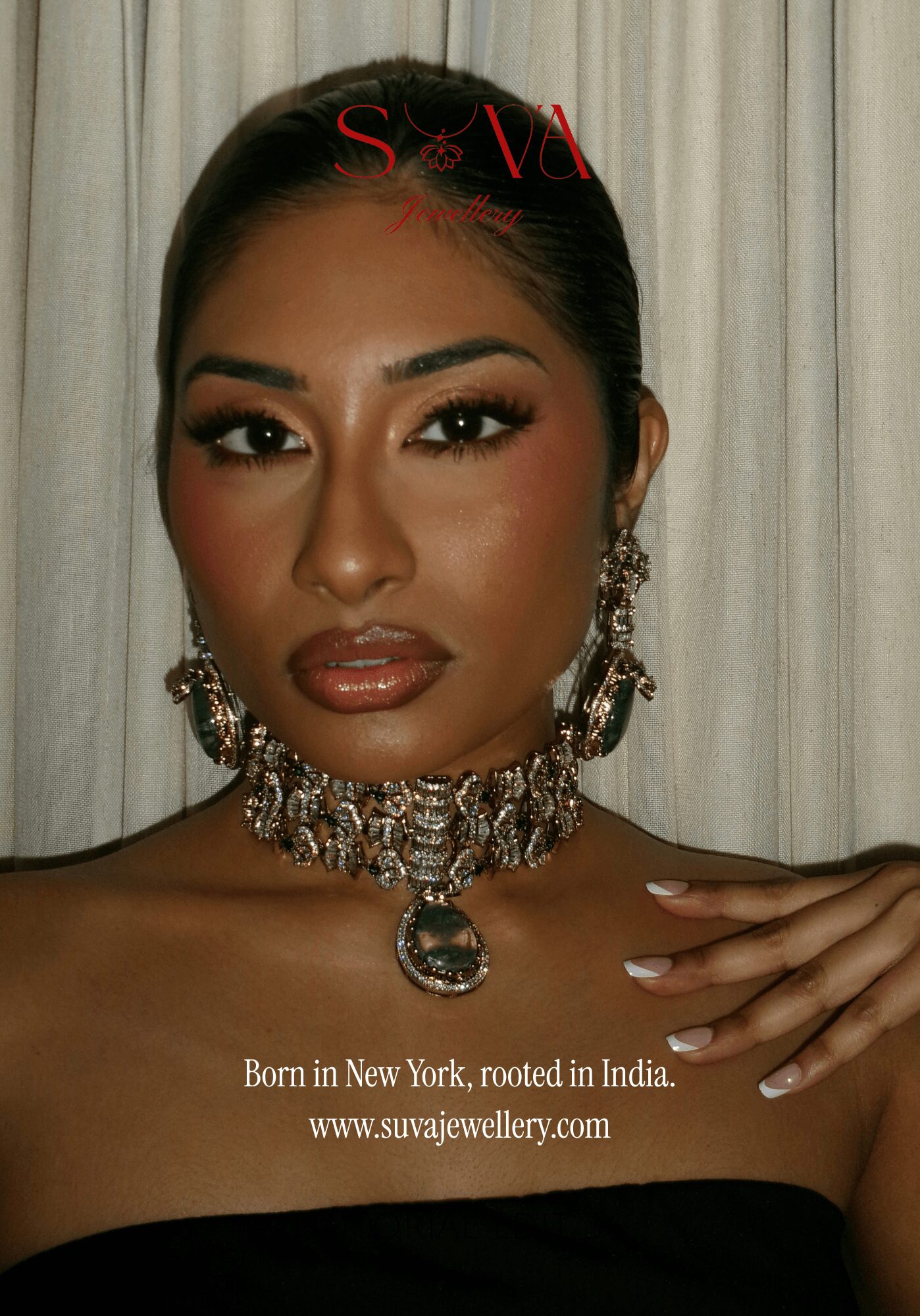 Woman with jewelry and makeup, standing in front of curtains, with text about birth and jewelry website.