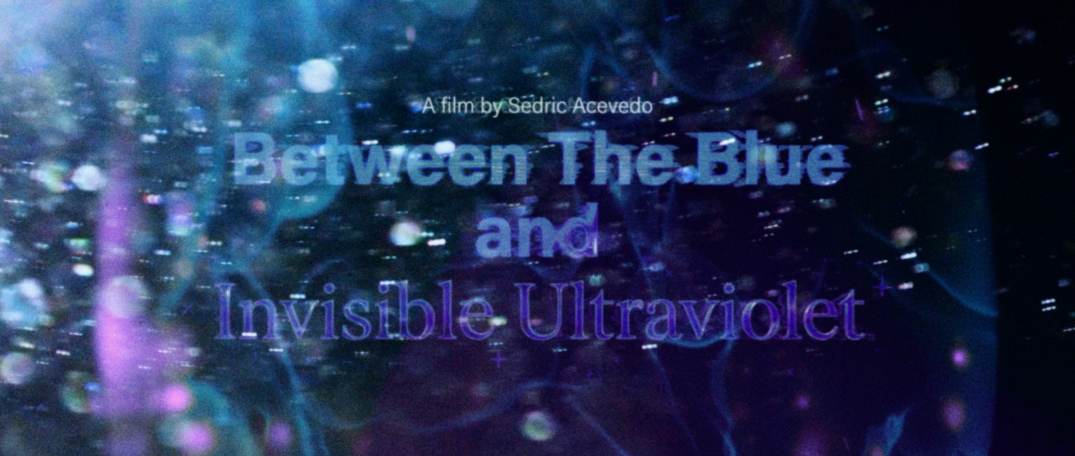 Title screen with text about blue and invisible ultraviolet, with colorful abstract background.