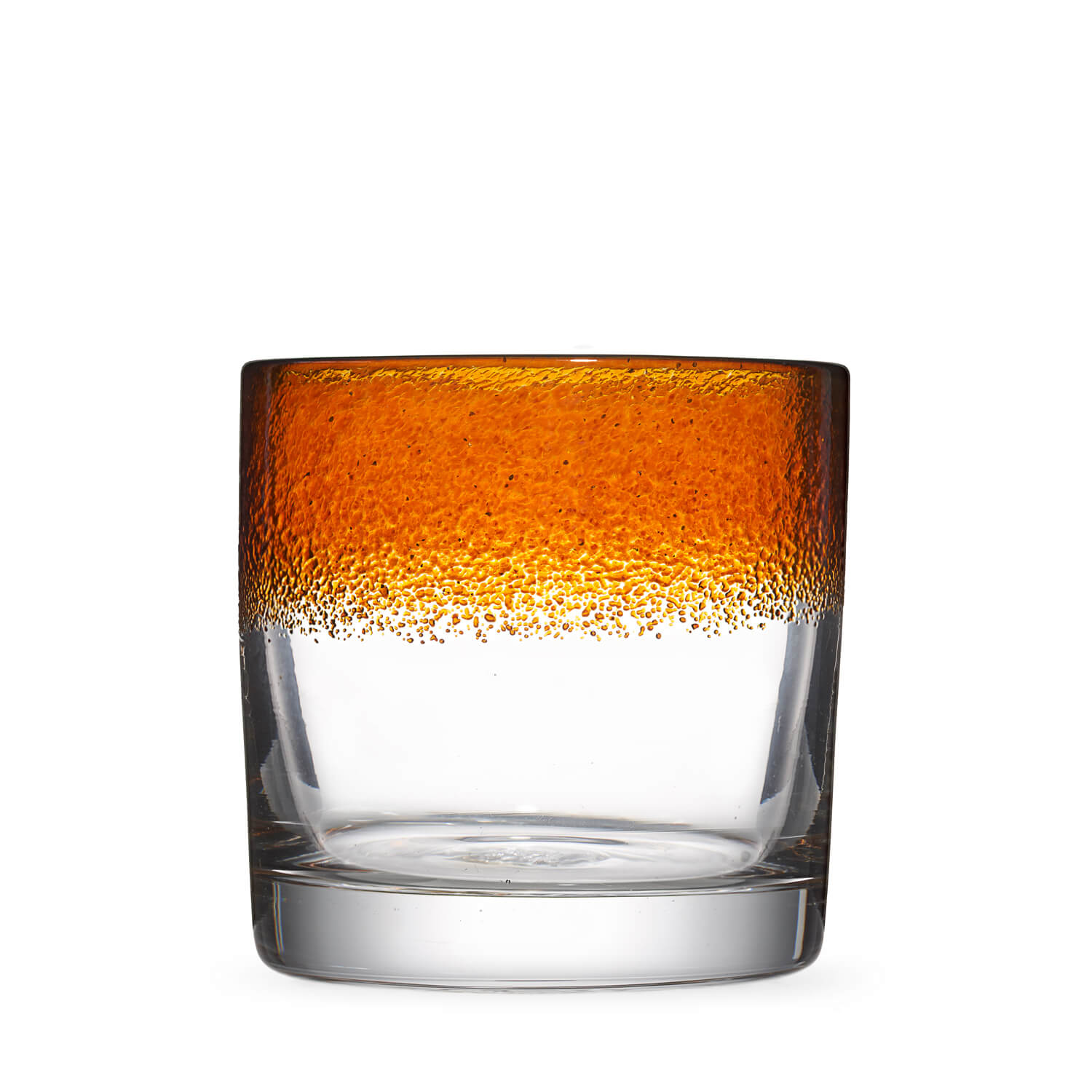 A glass with an orange liquid and foam on top, viewed from the front, with a white background.
