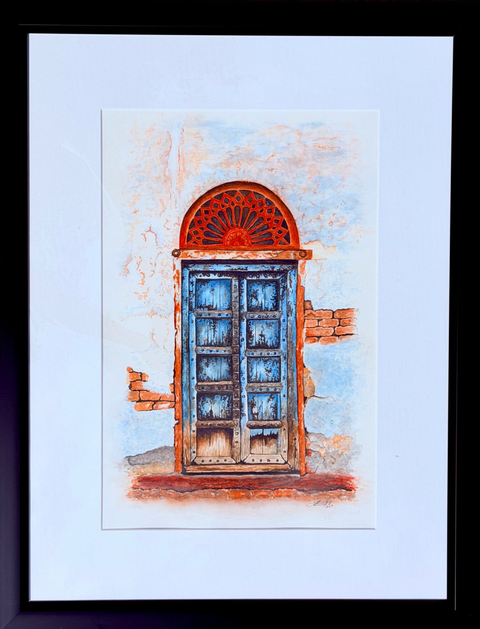 Blue wooden door with an arched window above, surrounded by a weathered wall with exposed bricks, painted in watercolor style.