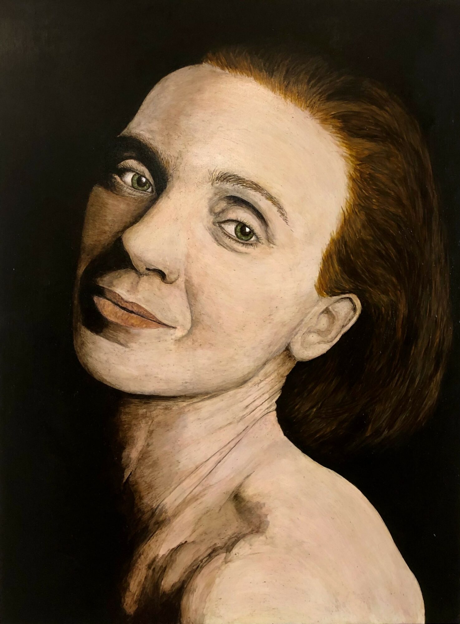 Portrait of a person with light skin, reddish-brown hair, and a slight smile, looking slightly to the side.
