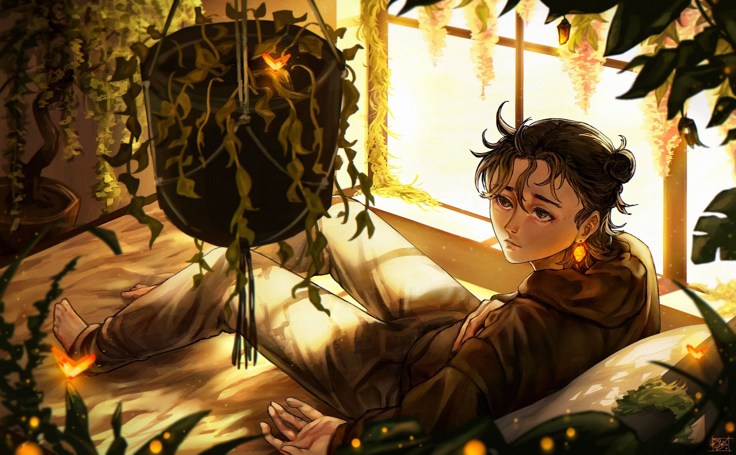 Person with dark hair lying on a bed surrounded by plants and warm sunlight, holding a book, in a cozy room.
