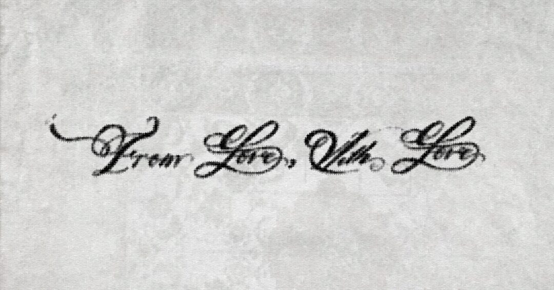 Handwritten cursive text reading 'From Love, Nita Love' on paper.