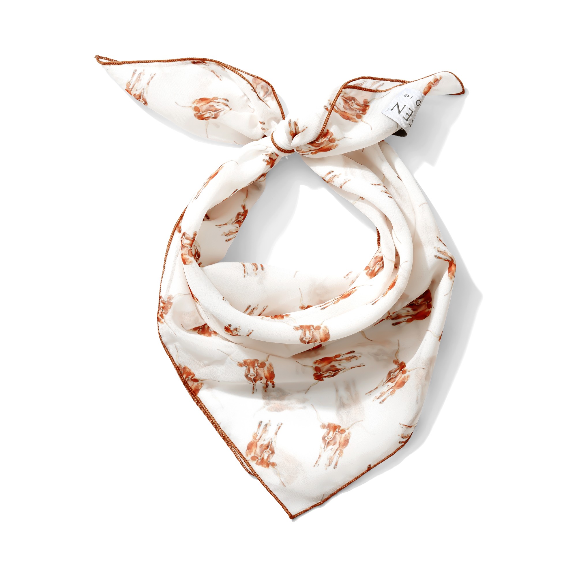 A white fabric bandana with brown animal print, tied in a knot, displayed against a white background.
