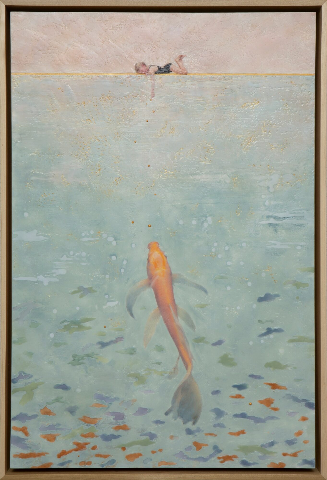 A painting depicts a person swimming underwater with a fish, with a person lying on the ground in the background.