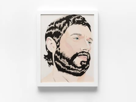 Portrait of a man with dark hair and a beard, facing right, in a white frame against a light background.