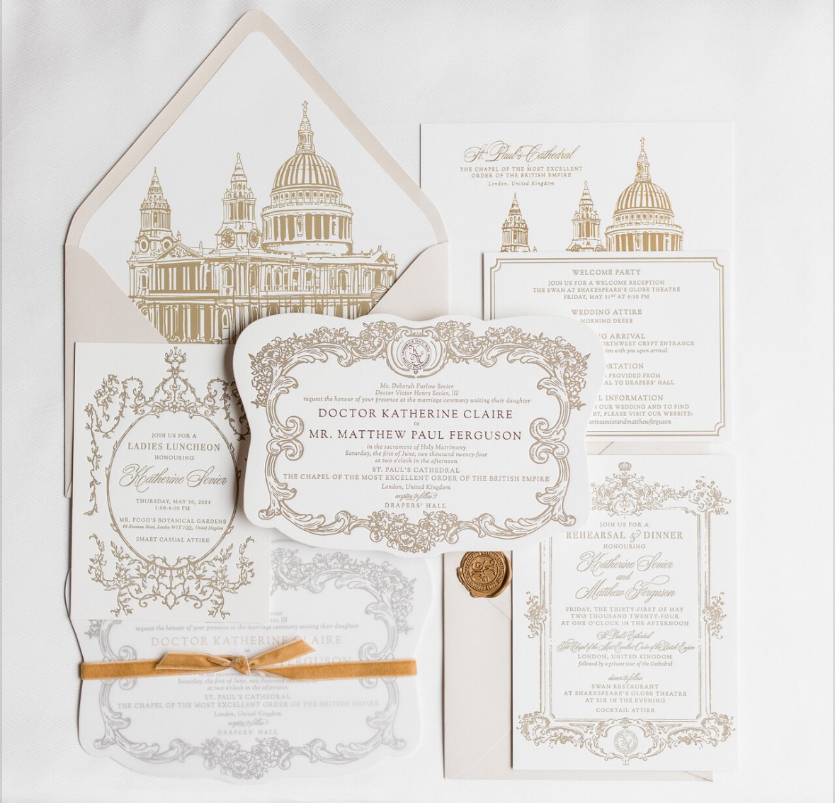 Wedding invitations and stationery with illustrations of a historic building, ornate borders, and a gold wax seal, arranged on a white background.