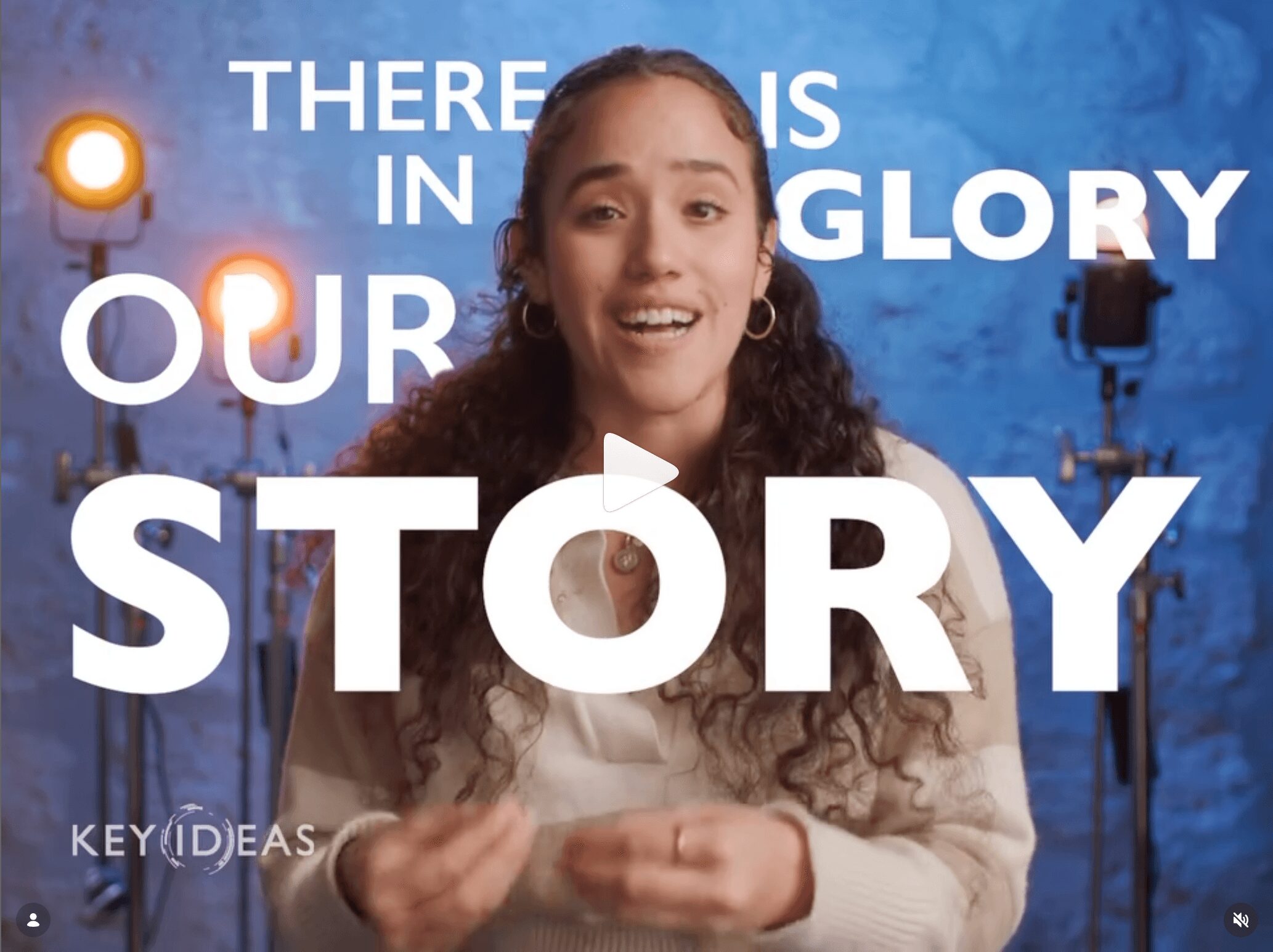 Young woman speaking with a blue background and studio lights, text reads 'There is in our story, glory.'
