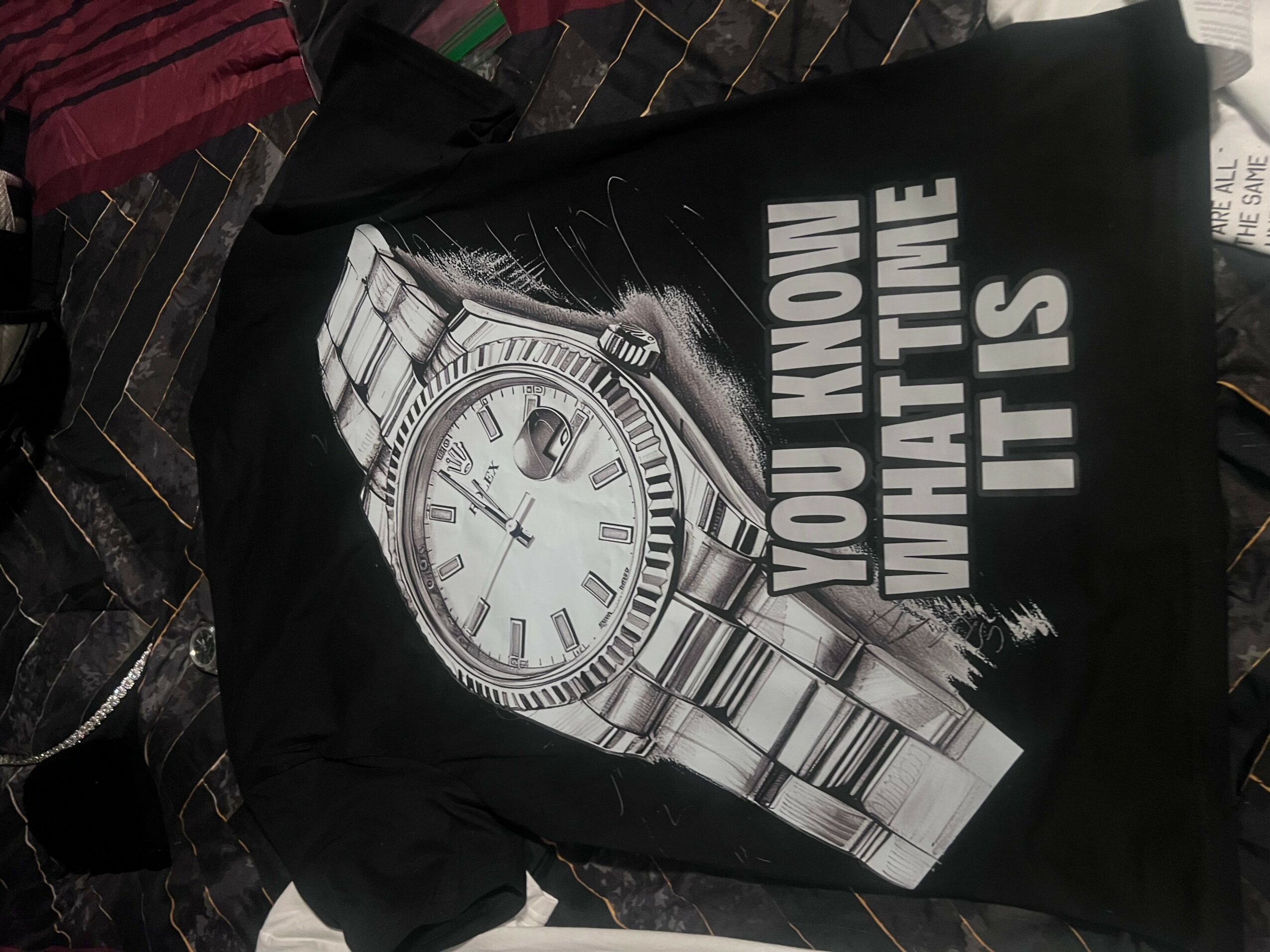 Black fabric with a large image of a silver watch and text reading 'You Know What Time It Is'.