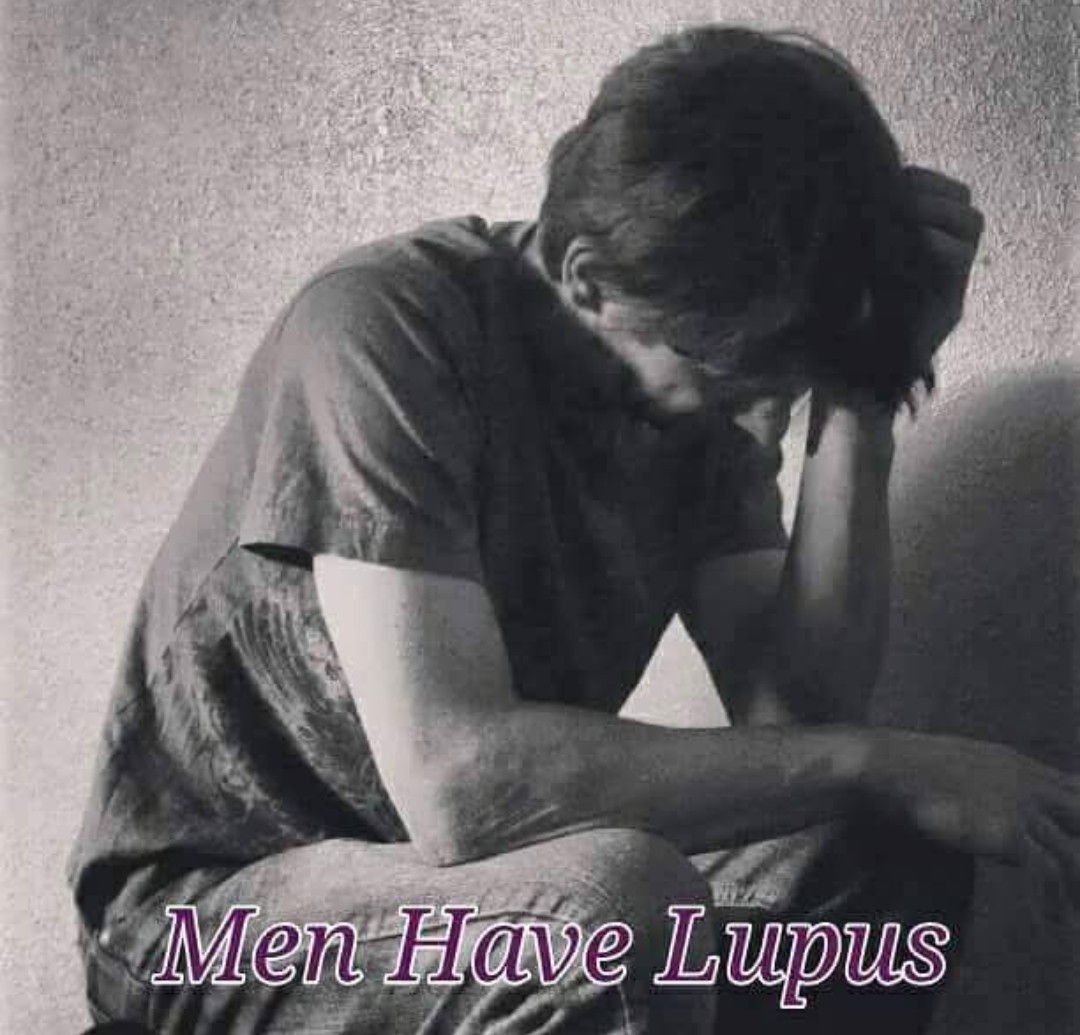 A person sitting with head bowed and hand on their head, with the text 'Men Have Lupus' at the bottom.