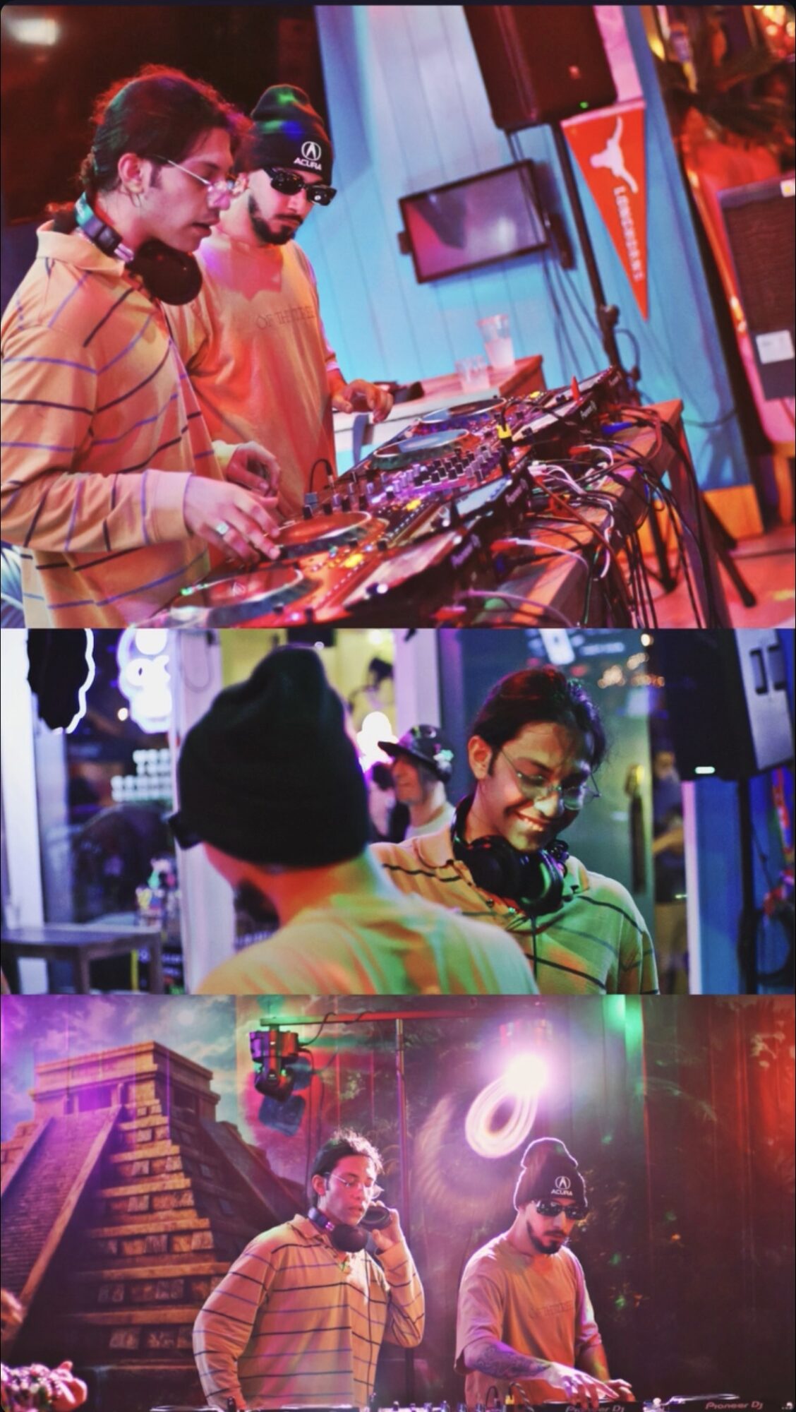 Three people at a DJ booth with colorful lighting, two wearing headphones, one smiling, and a third person in the background.
