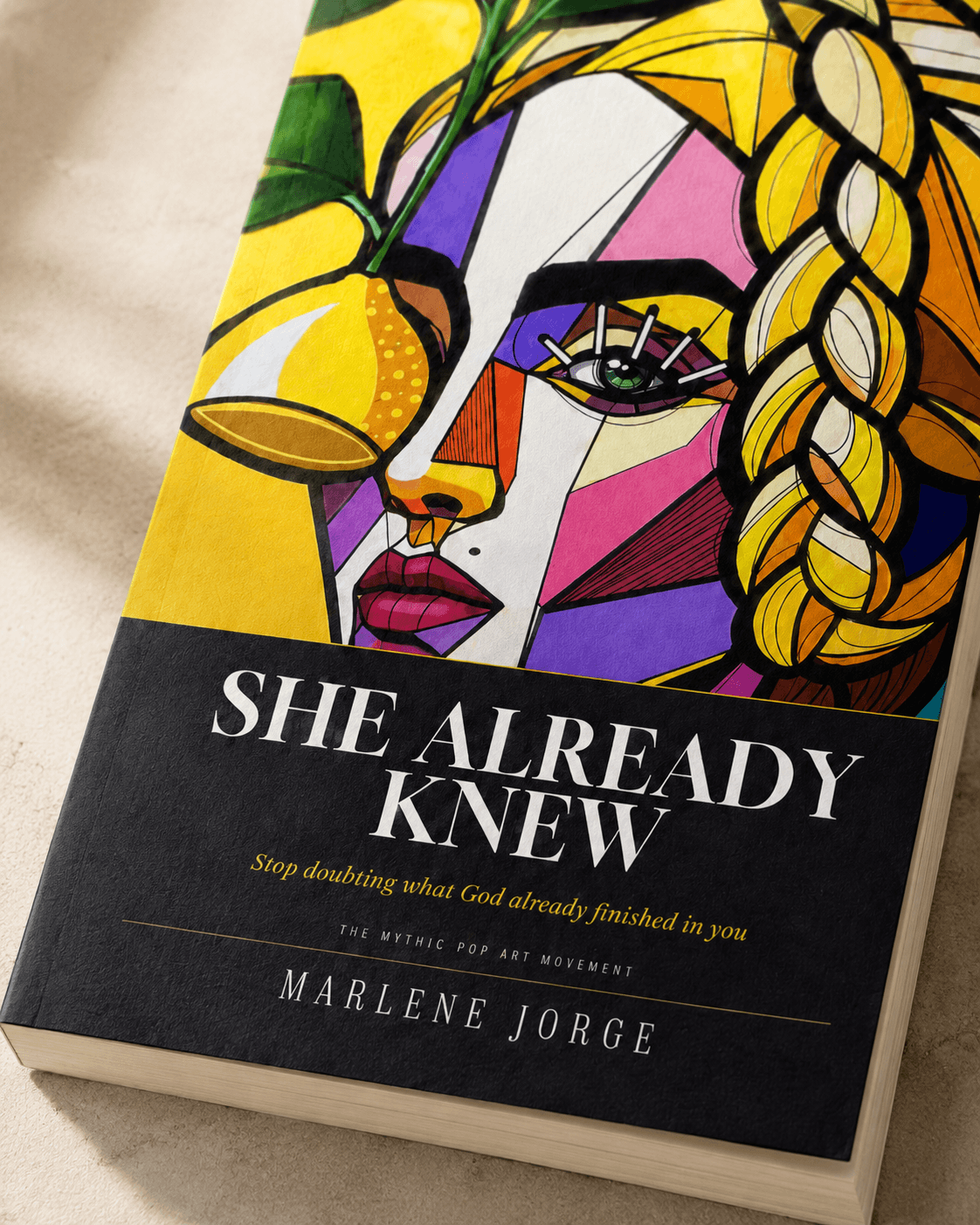 Book cover with colorful abstract portrait of a woman with braided hair, titled 'She Already Knew' by Marlene Jorge.