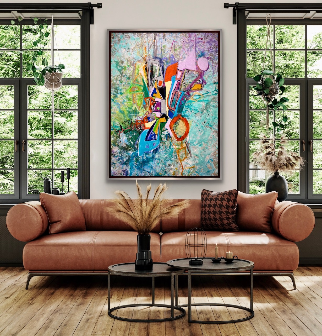 Living room with a pink sofa, abstract painting, two black coffee tables, and large windows with greenery outside.