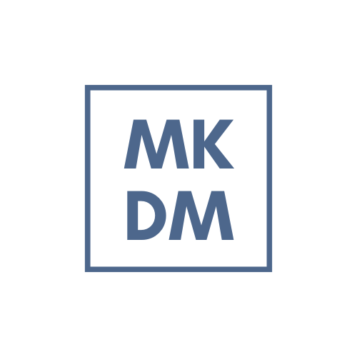 Logo with blue letters 'MK DM' inside a blue square border, centered on a white background.
