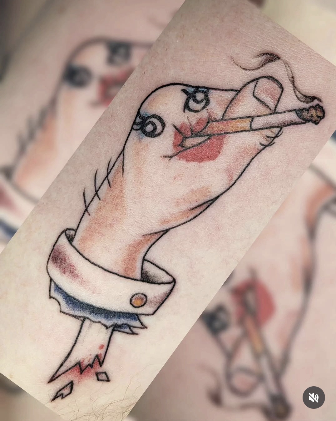 Tattoo of a hand holding a lit cigarette, with a face and clock elements, on a person's arm.