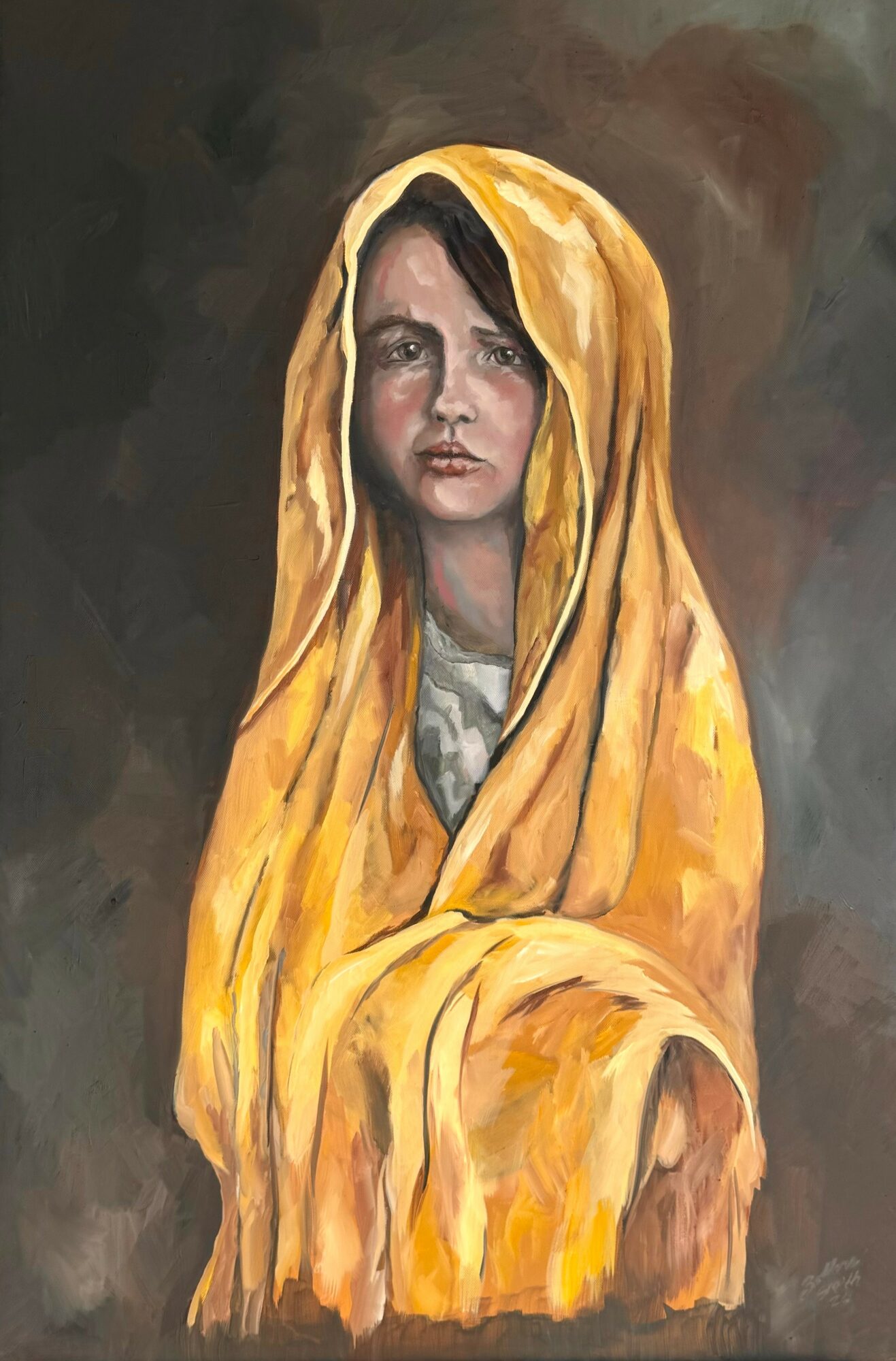 Portrait of a woman with dark hair, wearing a yellow shawl, against a dark background.