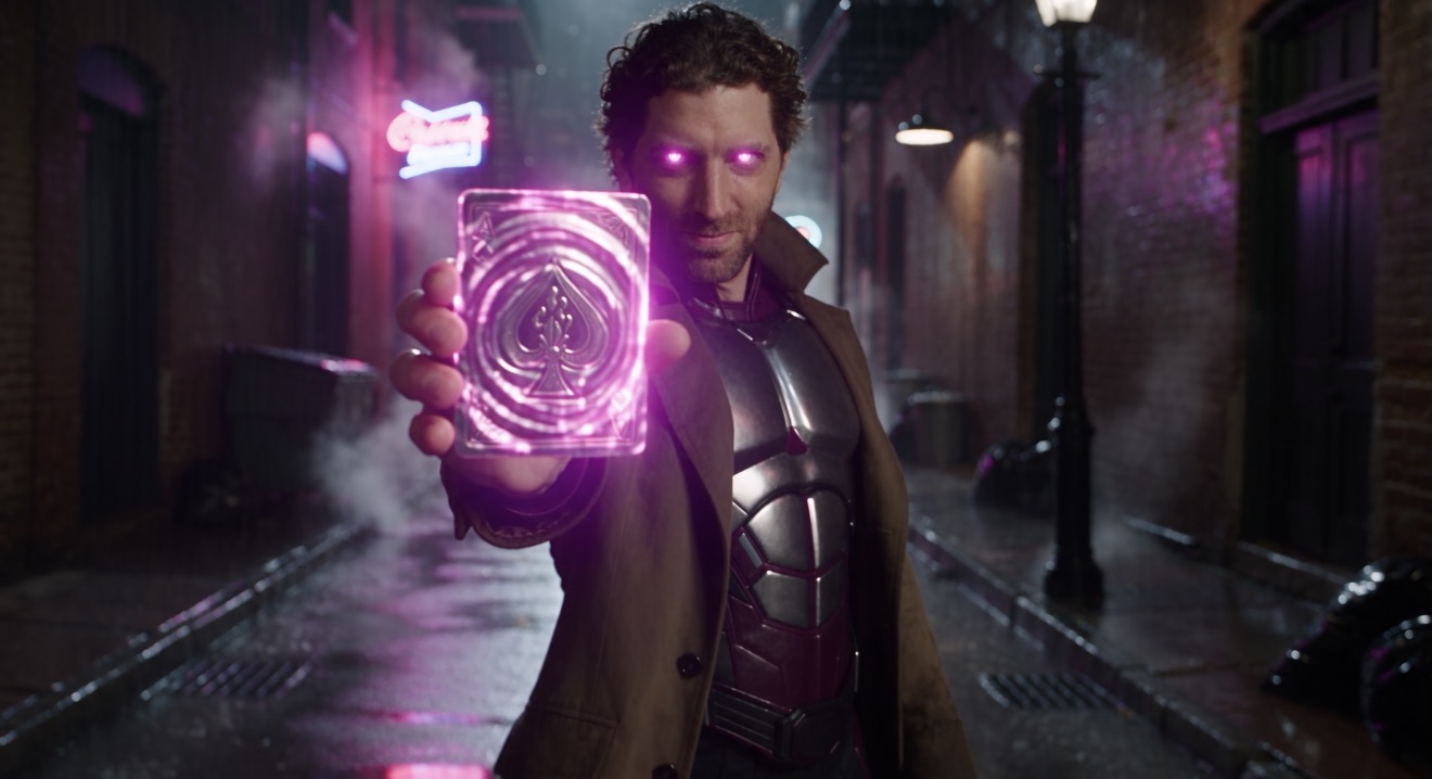 Person holding a glowing, holographic device in a dark, rainy alleyway at night.