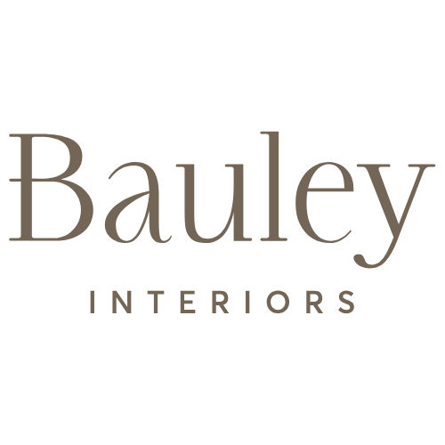 Black background with beige text reading 'Bauley Interiors'.