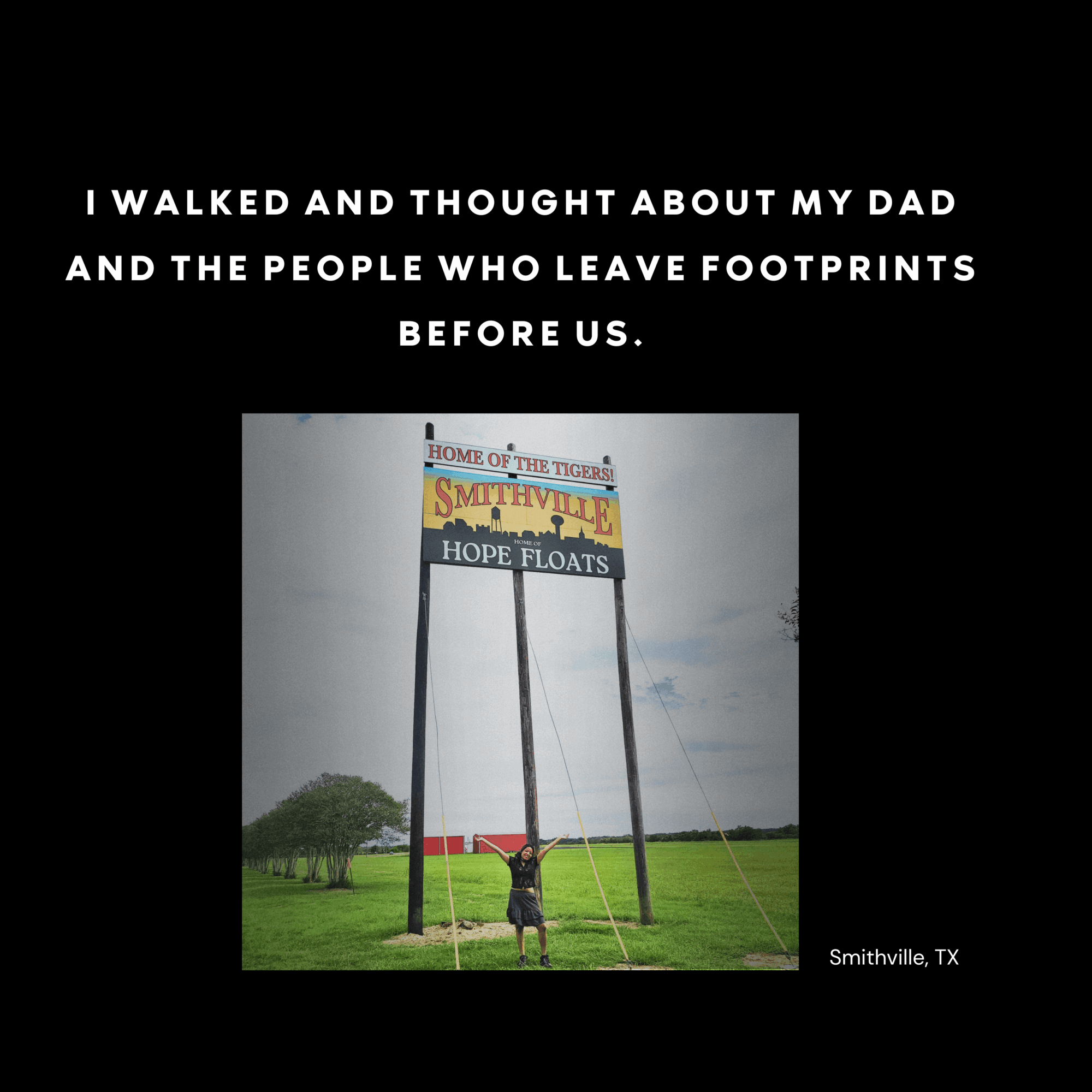Person standing in front of a tall sign with a blue sky and green field background, Smithville, TX, with a quote above.