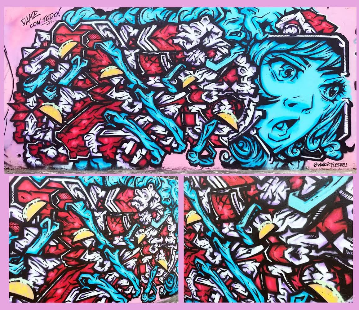 Graffiti art with a blue-haired girl, abstract shapes, and vibrant colors, including red, yellow, and black, in a comic style.