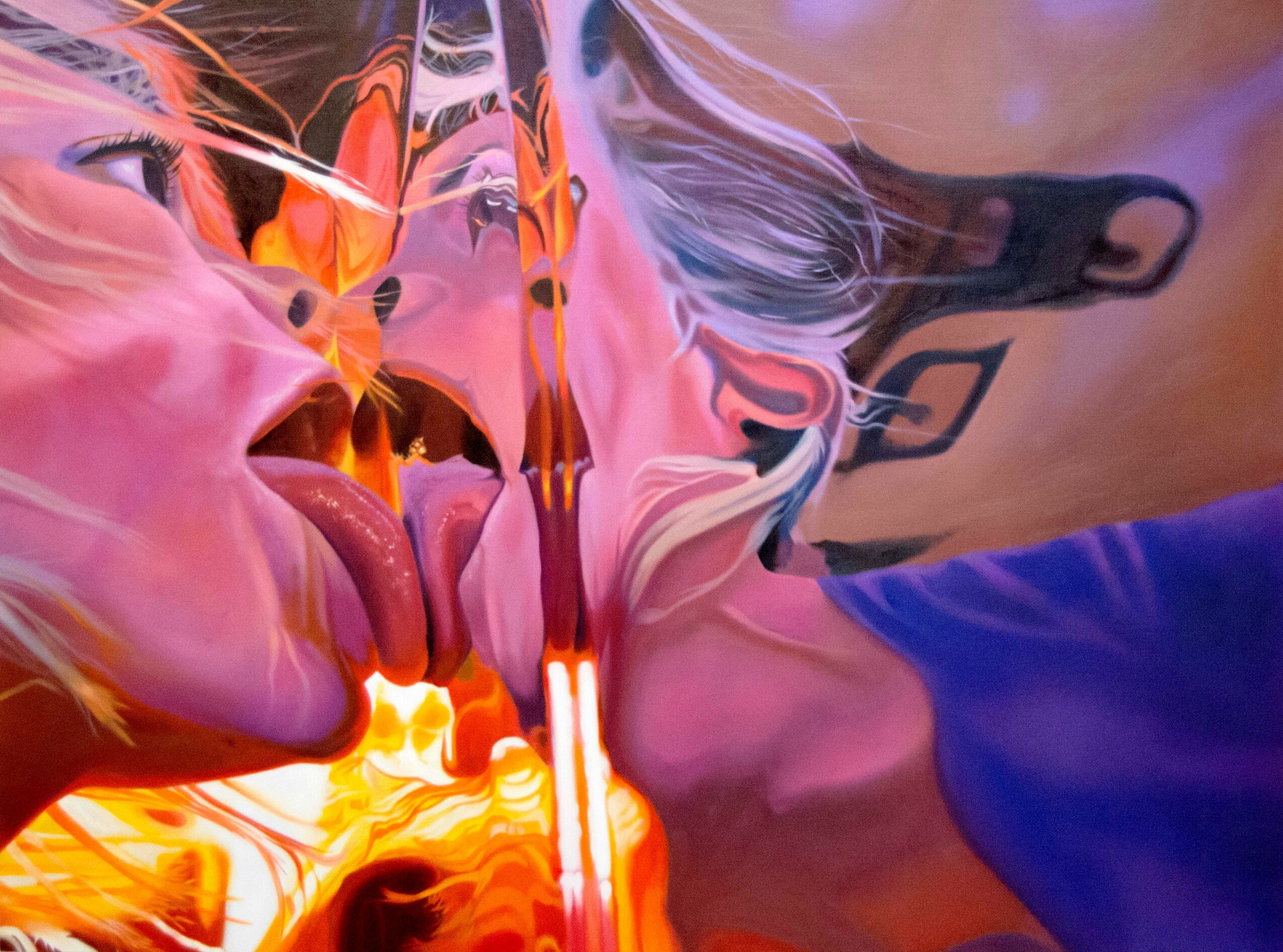 Two people with tongues out, close to each other, with colorful abstract background.