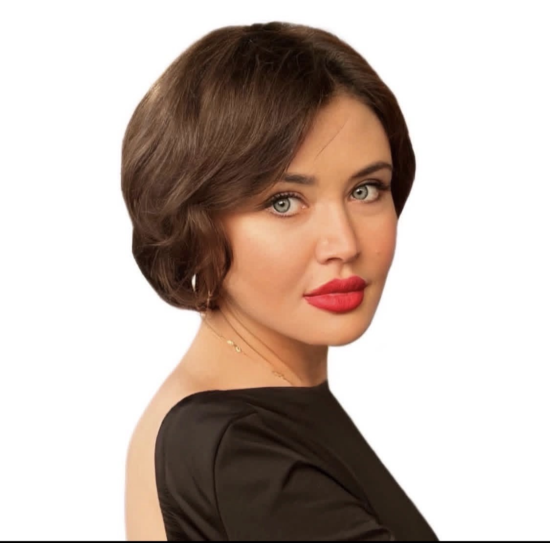 Woman with short brown hair and red lipstick, wearing a black top, looking at the camera.
