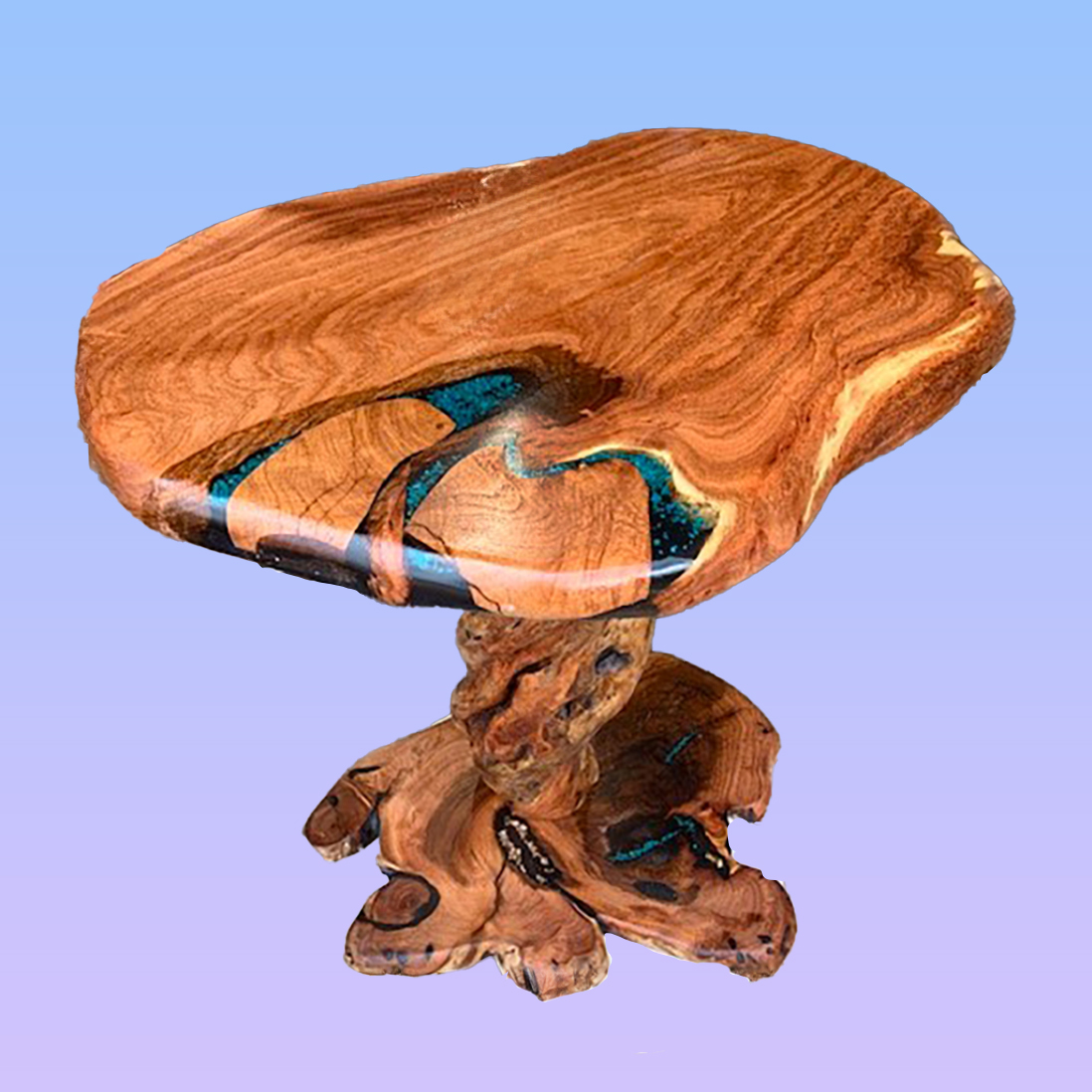 Wooden table with a natural, irregular shape and a blue resin inlay, supported by a carved wooden base, against a gradient background.