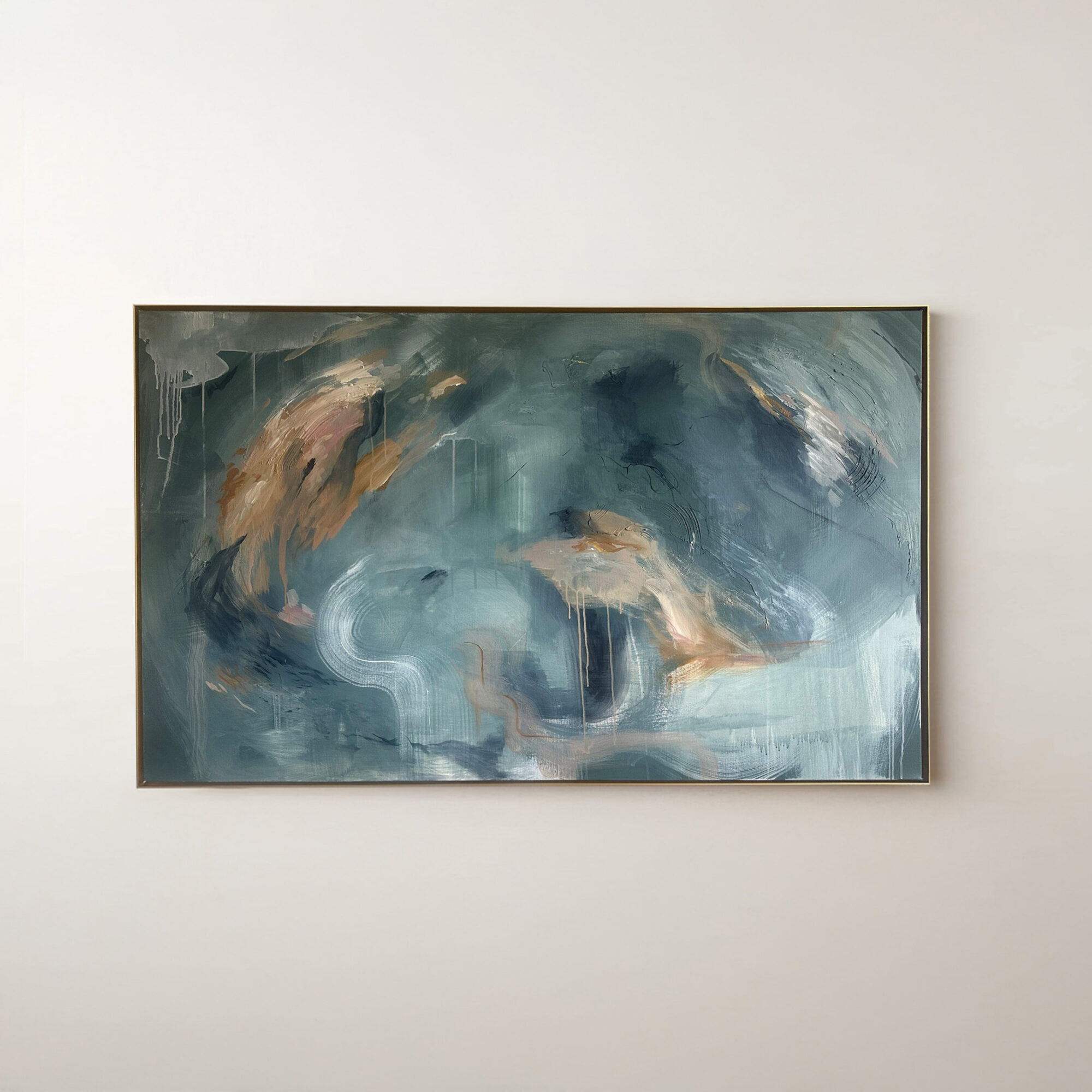 Abstract painting with blue, beige, and white brushstrokes on a rectangular canvas, hung on a white wall.