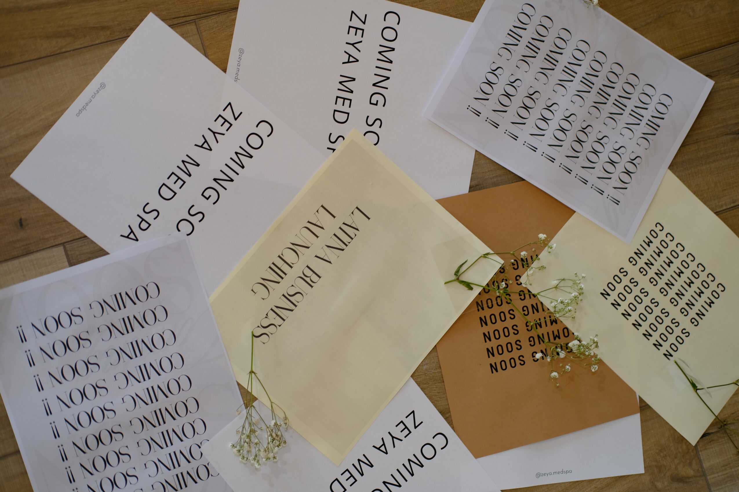 Several printed tickets and receipts scattered on a wooden surface, some overlapping each other.