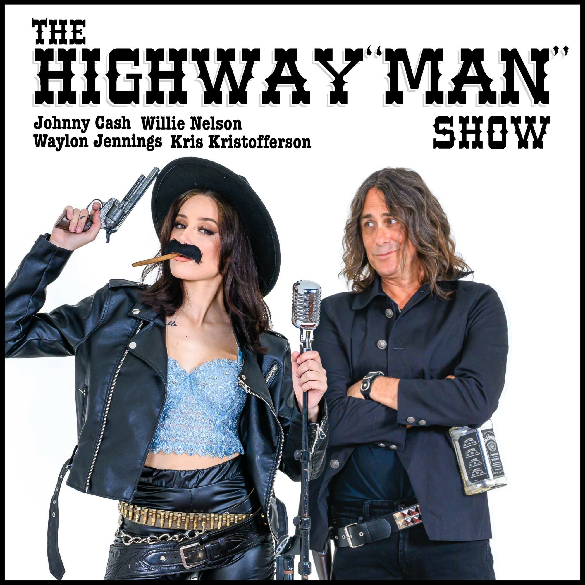 Two people stand in front of a sign that reads 'The Highway Man Show,' holding microphones and props, smiling.