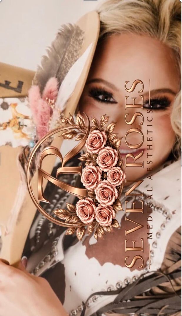 A person in a floral hat holds a decorative arrangement of pink roses above their face.